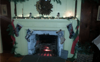 By the fireplace