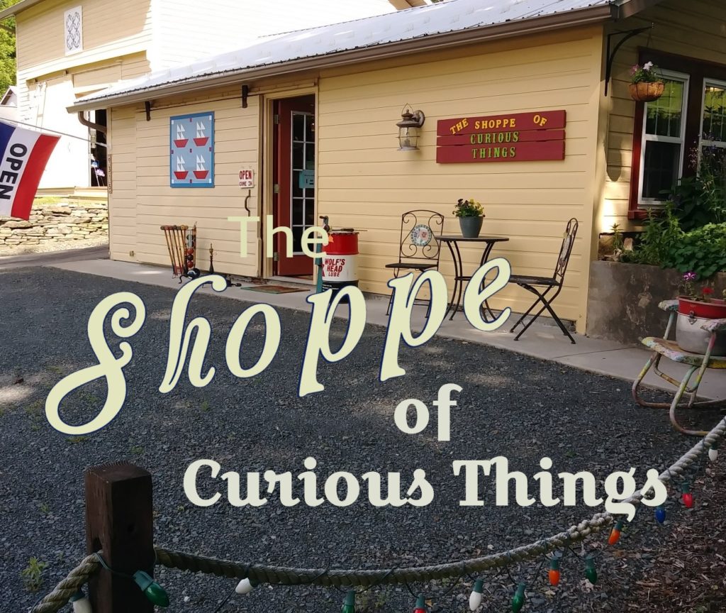 Gift with $10 Purchase at The Shoppe of Curious Things