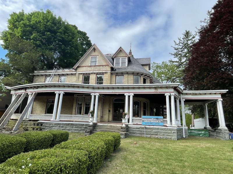 Exterior of the Metcalf Mansion, a massive Queen Anne-style home in Tunkhannock